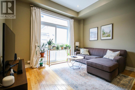 Living room - 8 Fairhead Mews, Toronto, ON M4E3Y4 Photo 1