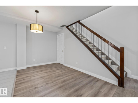 Living room - 810 5151 Windermere Bv Sw, Edmonton, AB T6W2K4 Photo 1