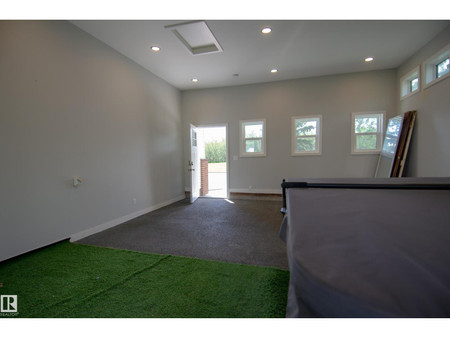 Living room - 843 Wanyandi Rd Nw, Edmonton, AB T5T2X3 Photo 1