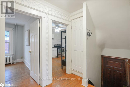 Upper 115 Balsam Avenue S